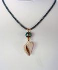Tahitian Black Pearl with Fossilized Druzy Shell and Sapphire Necklace…